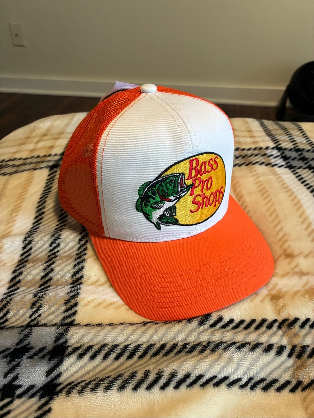 Bass Pro Shops Orange and White Logo Fishing Trucker Cap